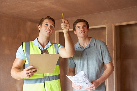 Home Inspector and builder inside home